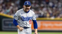 Los Angeles Dodgers pitcher Alex Vesia reacts after the final out of the eighth inning against the Arizona Diamondbacks at Chase Field.