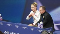 Amber Glenn (28) of the United States reacts after competing in the womens figure skating short program during the Milano Cortina 2026 Olympic Winter Games at Milano Ice Skating Arena.