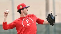 Philadelphia Phillies pitcher Andrew Painter (23) warms up during spring training at BareCare Ballpark.