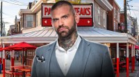 WWE color commentator Corey Graves in front of Pat's cheesesteak restaurant in Philadelphia, Pennsylvania, where Monday Night RAW was held.