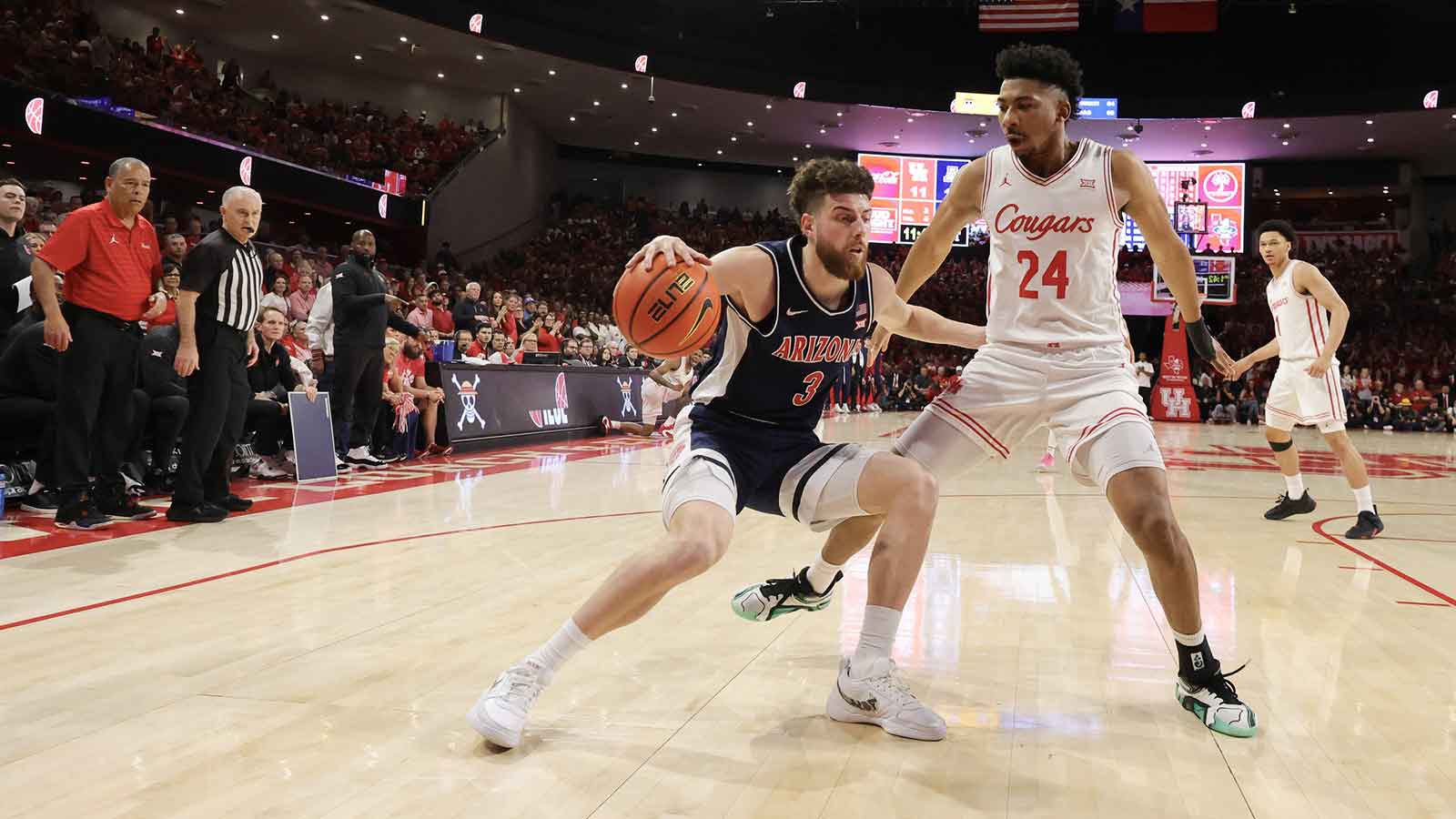 Arizona Wildcats guard Anthony Dell'orso (3) dribbles against Houston Cougars forward Chase McCarty (24) in the first half at Fertitta Center. Mandatory Credit: Thomas Shea-Imagn Images
