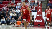Arkansas Razorback guard Darius Acuff Jr. (5) dribbles a fast break during the first half against the Alabama Crimson Tide at Coleman Coliseum.