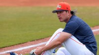 Houston Astros pitcher Tatsuya Imai (45) changes his shoes during a spring training workout at CACTI Park of The Palm Beaches.