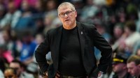 UConn Huskies head coach Geno Auriemma watches from the sideline as they take on the Butler Bulldogs at PeoplesBank Arena.