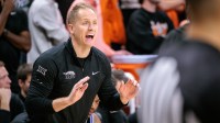 BYU Cougars coach Kevin Young reacts to a play during the second half against the Oklahoma State Cowboys at Gallagher-Iba Arena