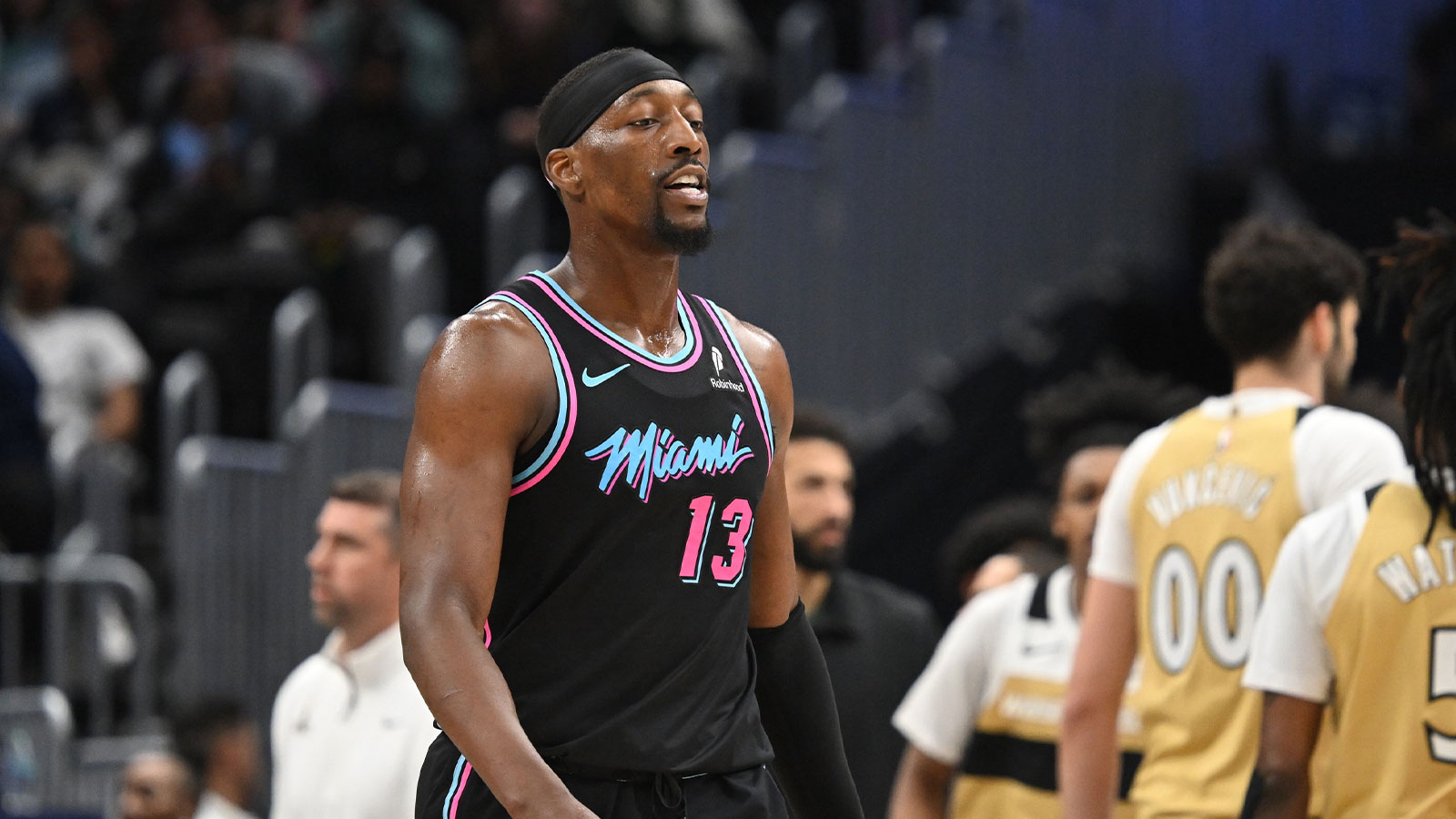 Miami Heat center Bam Adebayo (13) walks back the the bench during a game against the Washington Wizards during the first quarter at Capital One Arena. 