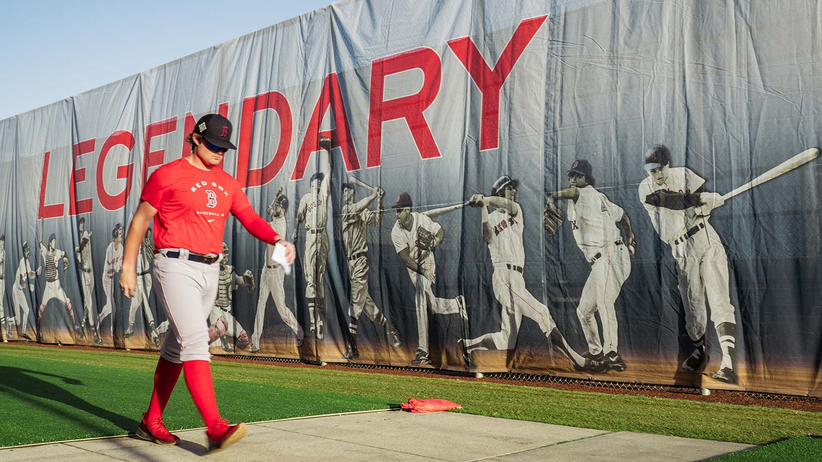 Red Sox prospect Blaze Jordan walks past a sign at JetBlue Park in Fort Myers, Florida, during spring training.