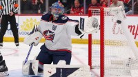Columbus Blue Jackets goaltender Elvis Merzlikins (90) defends his net against the New Jersey Devils during the second period at Prudential Center.