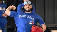 Toronto Blue Jays pitcher Dylan Cease (84) throws a pitch during spring training at the Bobby Mattick Training Center at Englebert Complex.