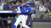 Toronto Blue Jays right fielder Anthony Santander (25) hits a single against the Seattle Mariners in the second inning during game one of the ALCS round for the 2025 MLB playoffs at Rogers Centre.