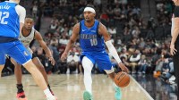 Dallas Mavericks guard Brandon Williams (10) dribbles in the second half against the San Antonio Spurs at Frost Bank Center.