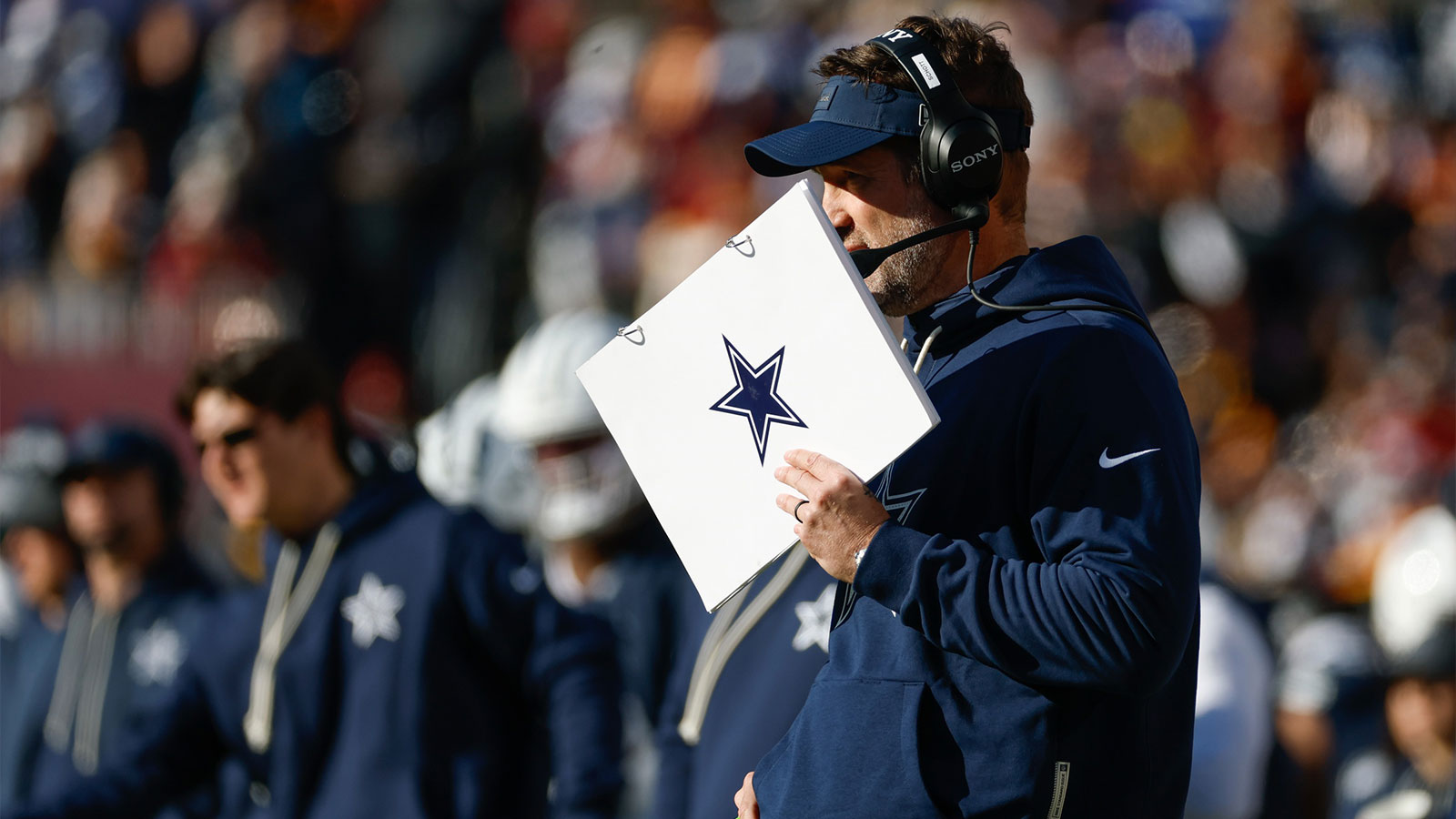 Dallas Cowboys head coach Brian Schottenheimer looks on in the first half against the Washington Commanders at Northwest Stadium.