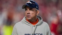 Denver Broncos head coach Sean Payton takes the field prior to a game against the Kansas City Chiefs at GEHA Field at Arrowhead Stadium.