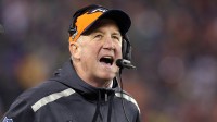 Feb 2, 2014; East Rutherford, NJ, USA; Denver Broncos head coach John Fox reacts during the first quarter against the Seattle Seahawks in Super Bowl XLVIII at MetLife Stadium