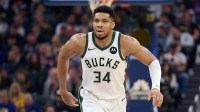Milwaukee Bucks forward Giannis Antetokounmpo (34) runs back on defense against the Golden State Warriors during the second quarter at Chase Center.