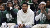 Milwaukee Bucks forward Giannis Antetokounmpo looks on from the bench during the first quarter against the New Orleans Pelicans at Fiserv Forum.