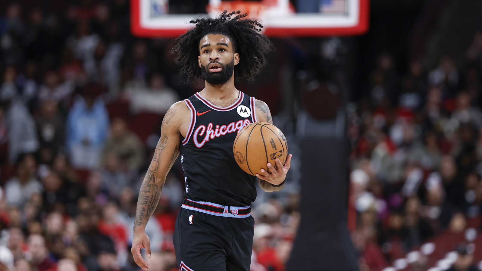 Chicago Bulls guard Coby White (0) brings the ball up court against the Miami Heat during the first half at United Center. 