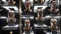 Sculpture of former Detroit Lions wide receiver Calvin Johnson, center left, next to Indianapolis Colts and Denver Broncos quarterback Peyton Manning on display at the Pro Football Hall of Fame Museum in Canton, Ohio on Thursday, July 31, 2025.