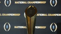 The College Football Playoff national champoin trophy at the CFP Champions press conference at Marriott Marquis Miami.