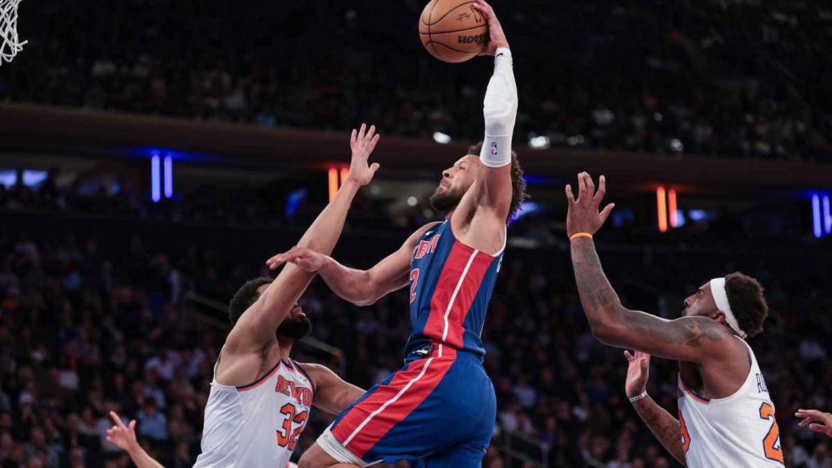 Detroit Pistons guard Cade Cunningham (2) goes up for a dunk against New York Knicks center Karl-Anthony Towns (32) during the second half at Madison Square Garden.