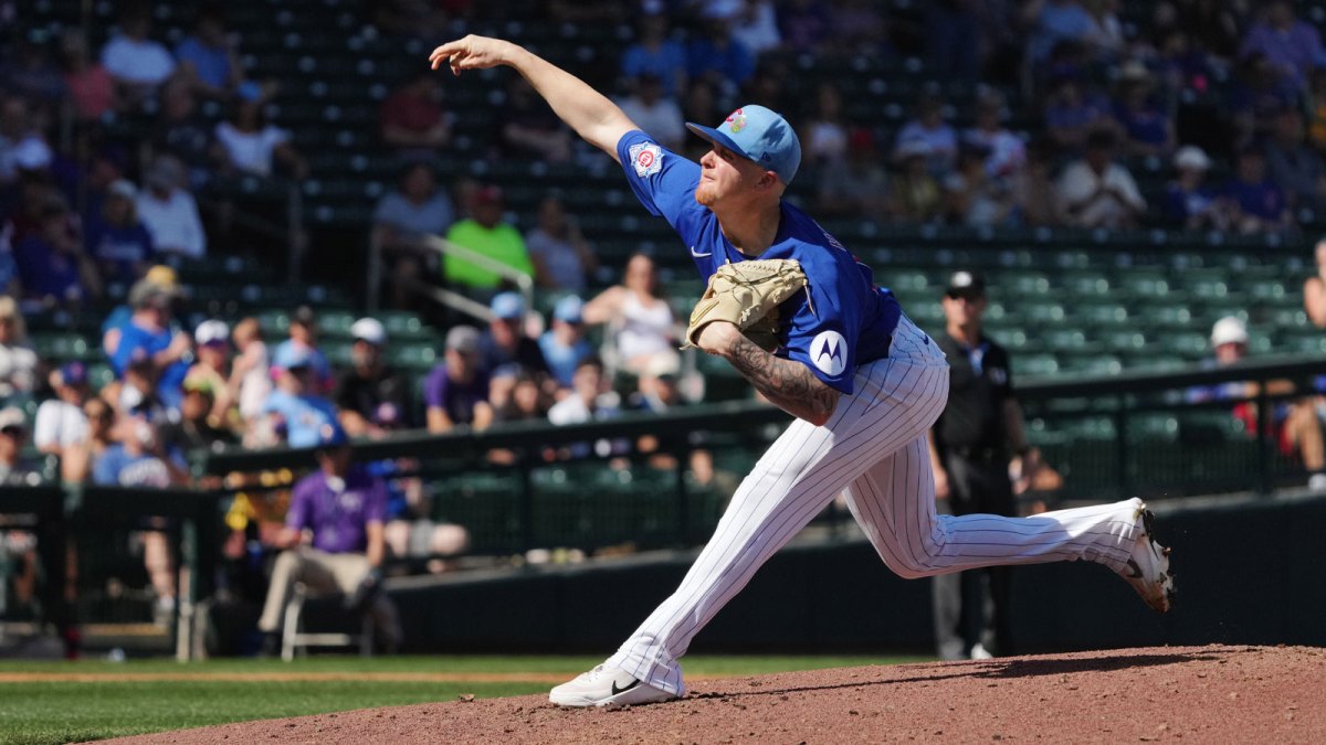 Chicago Cubs pitcher Cade Horton (22) throws against the Colorado Rockies in the third inning at Sloan Park.