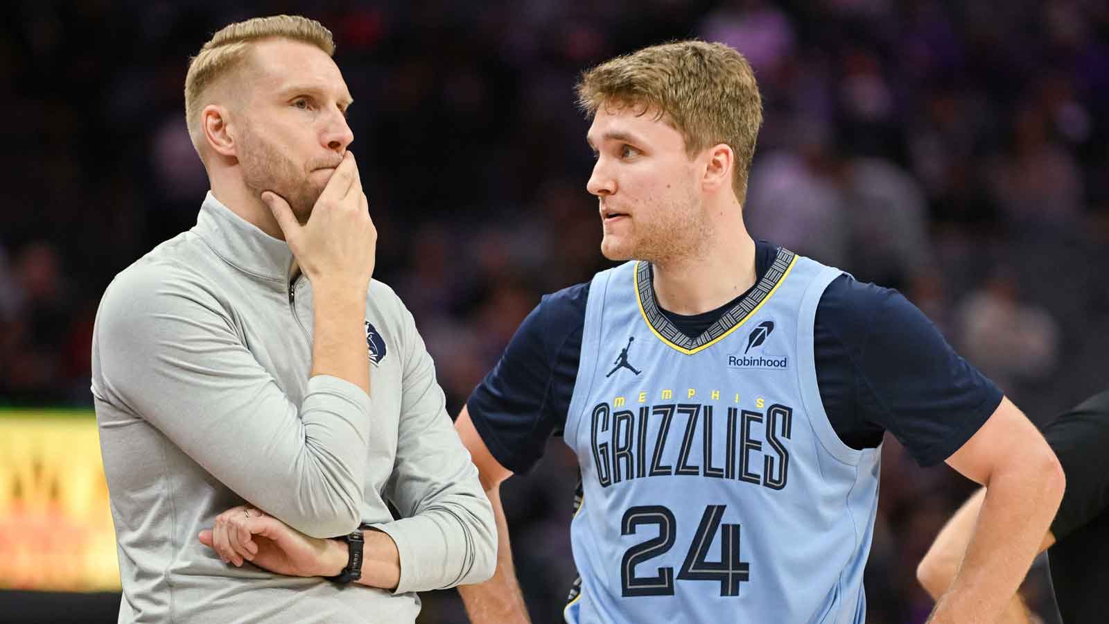 Memphis Grizzlies head coach Tuomas Iisalo and guard Cam Spencer (24) talk during a free throw in the fourth quarter against the Sacramento Kings at Golden 1 Center.