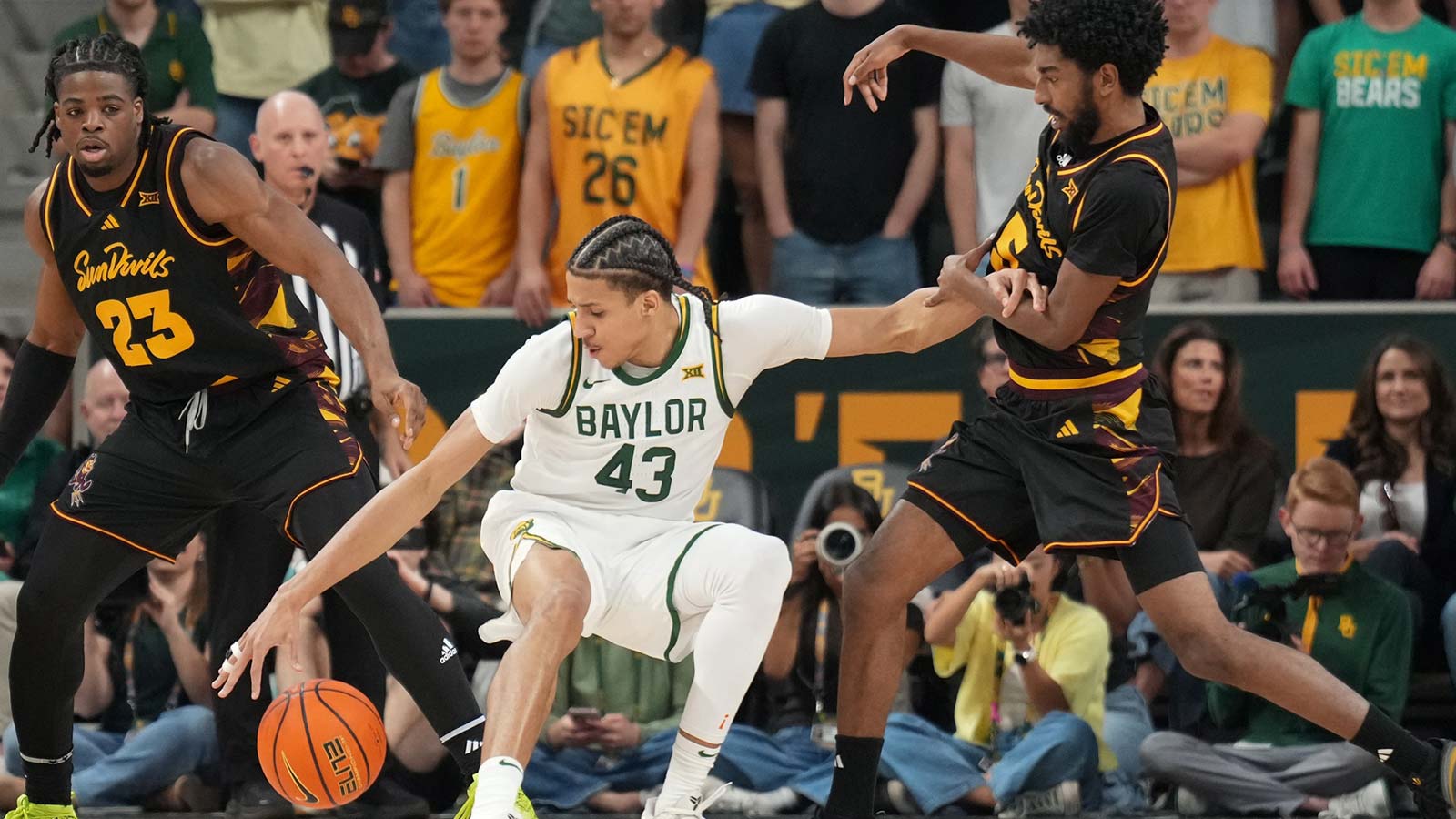 Baylor Bears guard Cameron Carr (43) loses control of the ball as Arizona State Sun Devils guard Maurice Odum (5) defends during the first half at Paul and Alejandra Foster Pavilion.