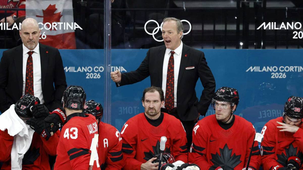 Canada head coach Jon Cooper reacts against Finland in a men's ice hockey semifinal during the Milano Cortina 2026 Olympic Winter Games at Milano Santagiulia Ice Hockey Arena