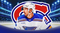 Jordan Kyrou in image looking neutral, Montreal Canadiens logo in image, hockey rink in background St. Louis Blues