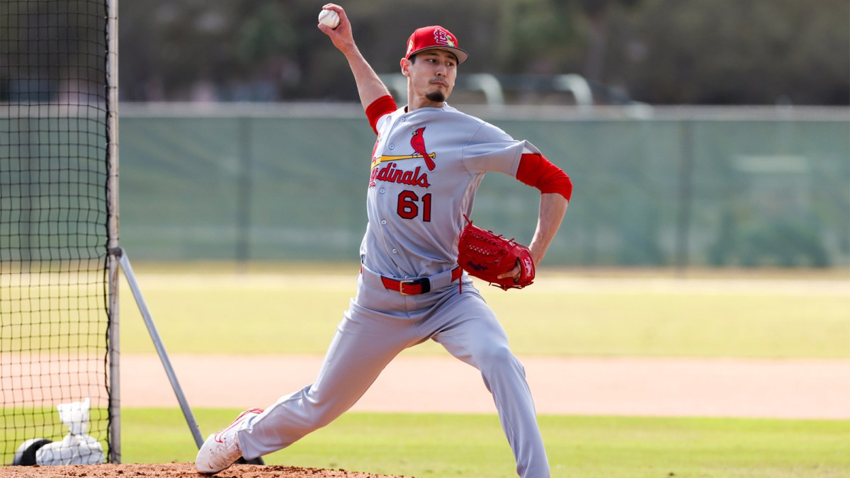 St. Louis Cardinals pitcher Riley O'Brien (61) delivers a pitch during a spring training workout at Roger Dean Chevrolet Stadium.