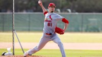 St. Louis Cardinals pitcher Riley O'Brien (61) delivers a pitch during a spring training workout at Roger Dean Chevrolet Stadium.