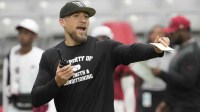 Arizona Cardinals defensive coordinator Nick Rallis directs his players during training camp at State Farm Stadium.