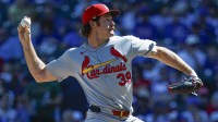 St. Louis Cardinals starting pitcher Miles Mikolas (39) delivers a pitch against the Chicago Cubs during the first inning at Wrigley Field.