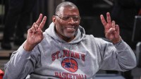 Former NFL linebacker Carl Banks enjoys the game between the New Mexico Lobos and the St. John's Red Storm at Madison Square Garden.