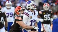 Buffalo Bills quarterback Josh Allen (17) is sacked by Cleveland Browns linebacker Carson Schwesinger (49) during the second half at Huntington Bank Field.