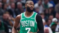 Celtics guard Jaylen Brown (7) reacts against the Dallas Mavericks during the first quarter at American Airlines Center with the Rockets logo in the background. Is Jaylen Brown playing tonight vs. the Rockets