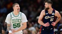 Celtics guard Baylor Scheierman (55) reacts after hitting