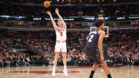 Feb 21, 2026; Chicago, Illinois, USA; Chicago Bulls guard Josh Giddey (3) makes a three-point basket against the Detroit Pistons during the first half at United Center. Mandatory Credit: David Banks-Imagn Images
