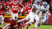 Kansas City Chiefs defensive end Mike Danna (51) tries to stop Detroit Lions running back David Montgomery (5) during the first half at Arrowhead Stadium in Kansas City, Missouri on Sunday, Oct. 12, 2025.