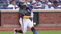 New York Mets second baseman Luisangel Acuna (2) hits an RBI double during the fifth inning against the Cincinnati Reds at Citi Field.