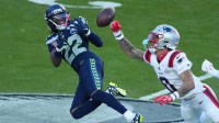 New England Patriots cornerback Christian Gonzalez (0) breaks up a pass intended for Seattle Seahawks wide receiver Rashid Shaheed (22) in the first half in Super Bowl LX at Levi's Stadium.