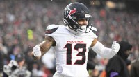 Houston Texans wide receiver Christian Kirk (13) celebrates a touchdown in the second quarter against the New England Patriots in an AFC Divisional Round game at Gillette Stadium.