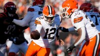 Cleveland Browns quarterback Shedeur Sanders (12) hands the ball off to running back Raheim Sanders (35) in the second quarter of the NFL Week 18 game between the Cincinnati Bengals and the Cleveland Browns at Paycor Stadium in Downtown Cincinnati on Sunday, Jan. 4, 2026.