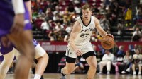 San Antonio Spurs forward Riley Minix (27) dribbles the ball against the Utah Jazz during the second half of a NBA basketball game at the Thomas & Mack Center.
