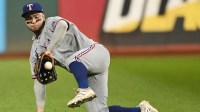 Texas Rangers left fielder Cody Freeman (39) fields a ball hit by Cleveland Guardians first baseman Kyle Manzardo (not pictured) during the ninth inning at Progressive Field.