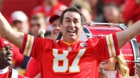 Comedian Rob Riggle rallies the crowd before the game between the Kansas City Chiefs and the Buffalo Bills at Arrowhead Stadium.