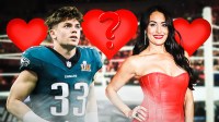 Philadelphia Eagles cornerback Cooper DeJean and WWE Hall of Famer Nikki Bella, who are rumored to be dating, with hearts and question mark around them.