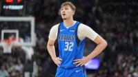 Dallas Mavericks forward Cooper Flagg (32) looks on in the first half against the San Antonio Spurs at Frost Bank Center. Mandatory Credit: Daniel Dunn-Imagn Images