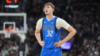 Dallas Mavericks forward Cooper Flagg (32) looks on in the first half against the San Antonio Spurs at Frost Bank Center.