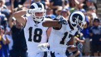 Los Angeles Rams wide receiver Cooper Kupp (18) and wide receiver Robert Woods (17) celebrates Kupp's second quarter touchdown against the Indianapolis Colts at Los Angeles Memorial Coliseum.